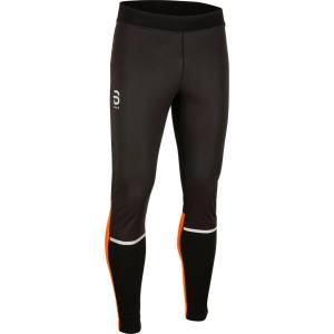 Daehlie Панталон за ски бягане Daehlie Tights Winter Wool 2.0 Cross-country ski trousers - Shocking Orange (003-2117-0211)