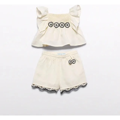 Abel & Lula Комплект потник с плетени цветя и къси панталонки за бебе момиче в кремав цвят Abel&Lula
