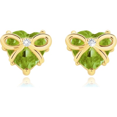 Šperky Eshop Náušnice ze žlutého 14K zlata, olivínové srdce s mašlí a zirkonem S3GG89.33