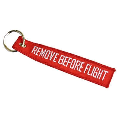 Prívesok na kľúče Remove before flight červený
