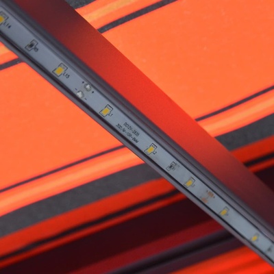vidaXL Ručně zatahovací markýza s LED světlem 600x300 cm oranžovohnědá