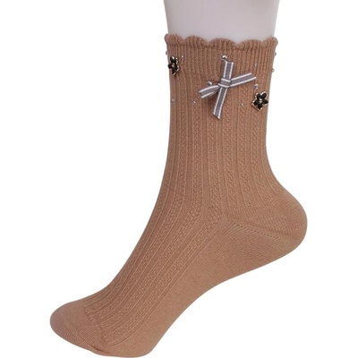 Светлокафяви дамски чорапи с цветя, камъчета и панделка