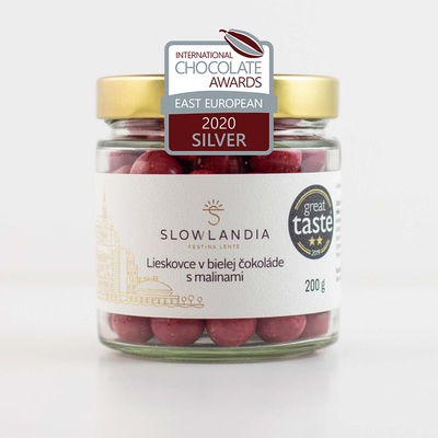 SLOWLANDIA Lieskovce v bielej čokoláde s malinami 200 g