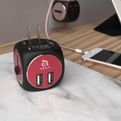 ADAM elements Адаптер за ел. мрежа с преходници за цял свят и два USB-A изход за зареждане (черен-червен) - Adam Elements Omnia TA502 Universal Travel Adapter (APAADTA502BRD)