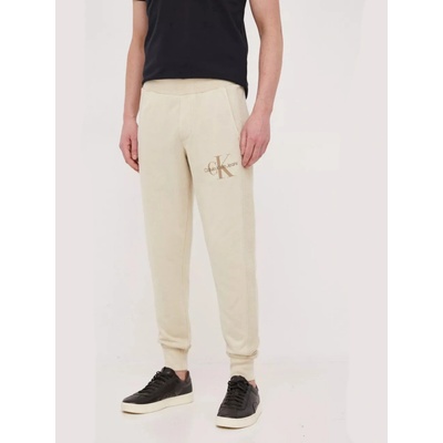Calvin Klein Jeans Bavlněné tepláky béžová J30J322929.PPYX