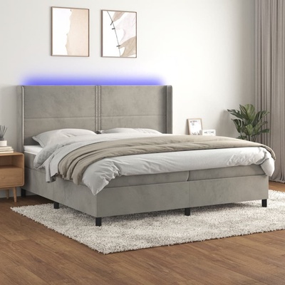 Petrashop 3139523 boxspring postel s matrací a LED světle šedá samet