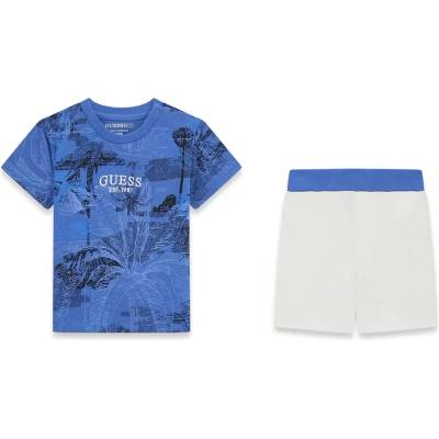 Guess Синя тениска с палми и бял надпис Guess и бели къси панталони за бебе момче