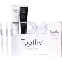 Toothy Launcher Set LED světlo pro bělení zubů + Náústek na LED světlo + Bělící gely na 6 dní 3 ks + Ranní zubní pasta 65 g + Večerní zubní pasta 65 g