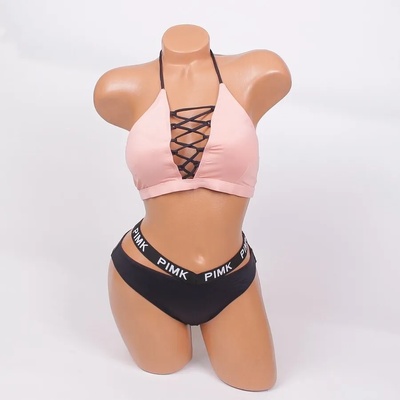 Стилен бански в бледорозово и черно