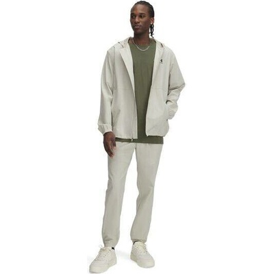 Under Armour tepláky s elastickým pasem Vibe Woven šedá