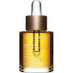 Clarins Lotus Treatment Oil регенериращо масло с изглаждащ ефект дневен и нощен 30ml