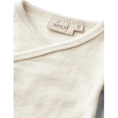 Wheat Бебешко боди от мериносова вълна Wheat (9136k.775)