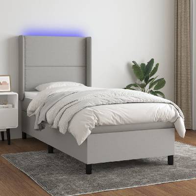 Petrashop 3138213 boxspring postel s matrací a LED světle šedá textil
