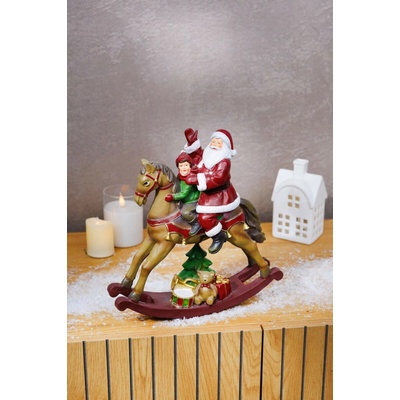MagicHome Dekorácia Vianoce Santa s chlapčekom na koni polyresin 28x10x30 cm