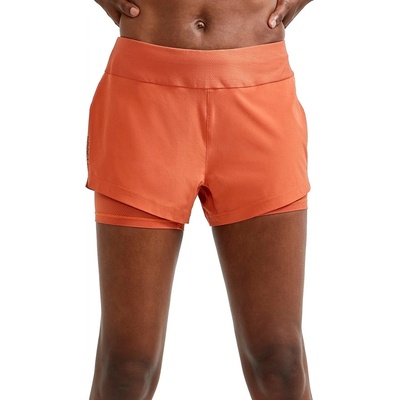 Craft W šortky ADV Essence 2v1 oranžová