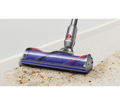 Dyson V12 Detect Slim Absolute 2023, stojící bezdrátový vysavač s hubicí.