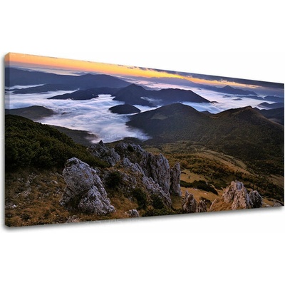 Obraz slovenských skál nad morom oblakov na plátne — panoráma - 30x60 cm