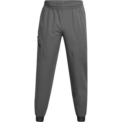 Under Armour B Unstoppable WOVEN joggers šedé 1388823-025