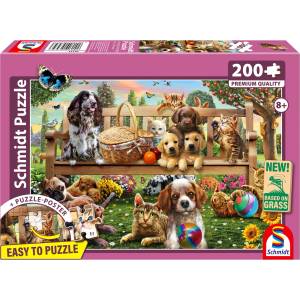 Schmidt Spiele - Puzzle A garden picnic for dogs and cats - 200 piese