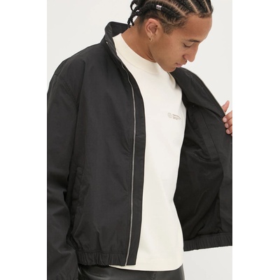Tommy Jeans Яке Tommy Jeans в черно преходен модел с уголемена кройка DM0DM20655 (DM0DM20655)