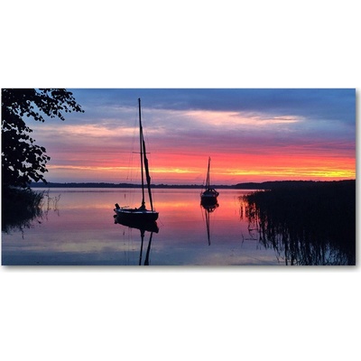 Fotoobraz na skle Plachetnica pri západe slnka 100x50 cm