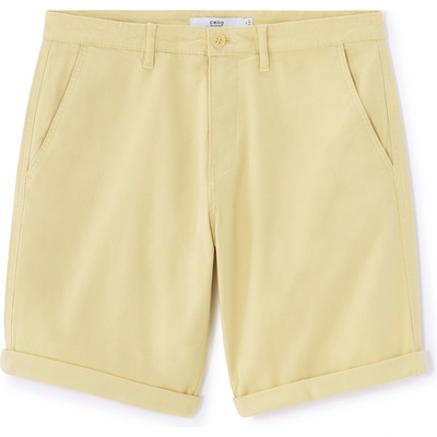 Celio Pánske žlté chino kraťasy žltá