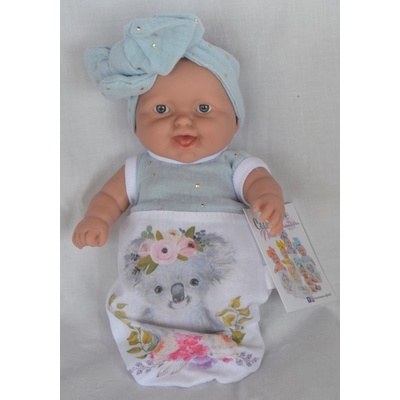 Marina & Pau Realistické miminko holčička smějící se Maruška se světle modrou mašlí Cookie Nana 20 cm