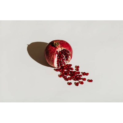 Plakát, Obraz - ut pomegranate on a white background., Tanja Ivanova, 40 × 26.7 cm