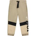 Guess Спортен панталон Guess - С черни ленти, бежов, 12 м (N4BQ11-KAD73-F1BA-12M) - ozone