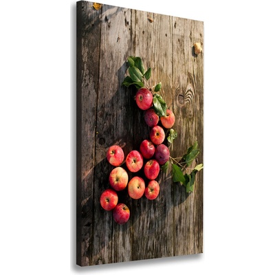 Vertikálny foto obraz na plátne Jablká na stole 50x100 cm
