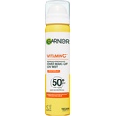 Garnier Vitamin C Brightening Over Make-Up UV Mist SPF50+ dlhotrvajúca rozjasňujúca opaľovacia h ml a na tvár 75 ml