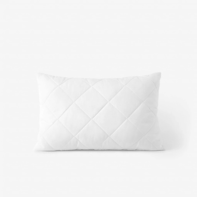 Goldea prošívaný polštář Comfort s výplní z polyesterových kuliček z dutého vlákna 60x40