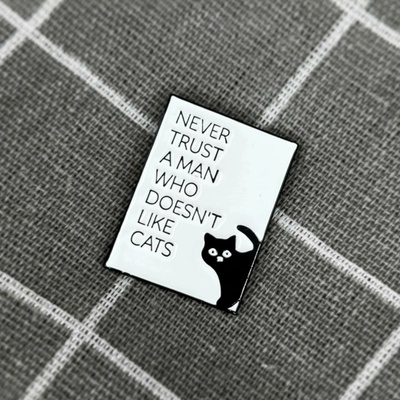 Pinarna Never trust a man who doesn’t like cats Nikdy nevěř muži, který nemá rád kočky