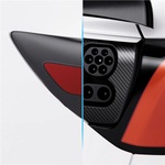 Spigen Комплект защитно фолио и обвивка Spigen Tesla за заряден порт (ЕС), карбон - Tesla Model Y/3 (ACP07595)