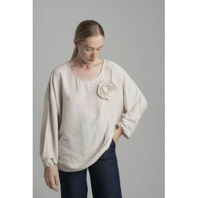 Beige oversize blouse with a decorative flower šedá
