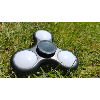 Svítící fidget spinner růžový