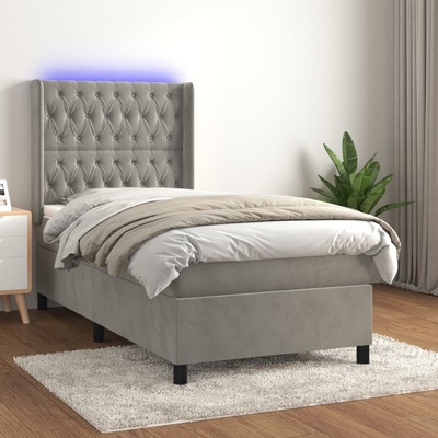 Petrashop 3139727 boxspring postel s matrací a LED světle šedá samet