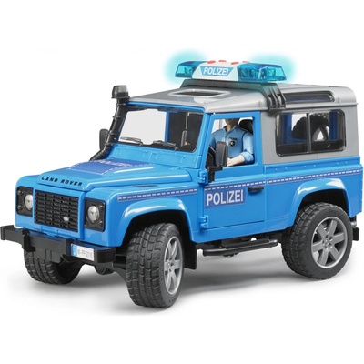 Bruder 2597 Policejní Land Rover Defender + policista a maják