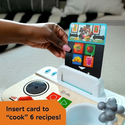 BABY EINSTEIN Hračka hudební Kuchyňka Magic Touch Kitchen™ Pretend to Cook HAPE 9m+