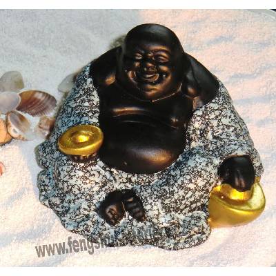 Sedící Buddha s ingotem