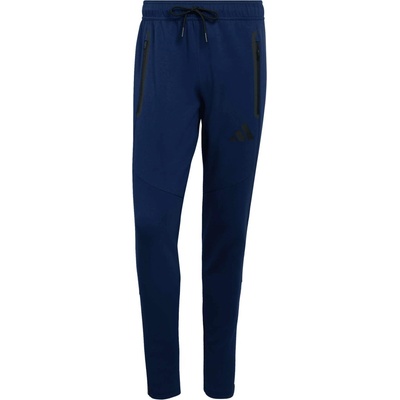 adidas TIRO TRAVEL SW PANT Tmavě modrá Černá